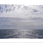 Ocean, waves, sun, clouds